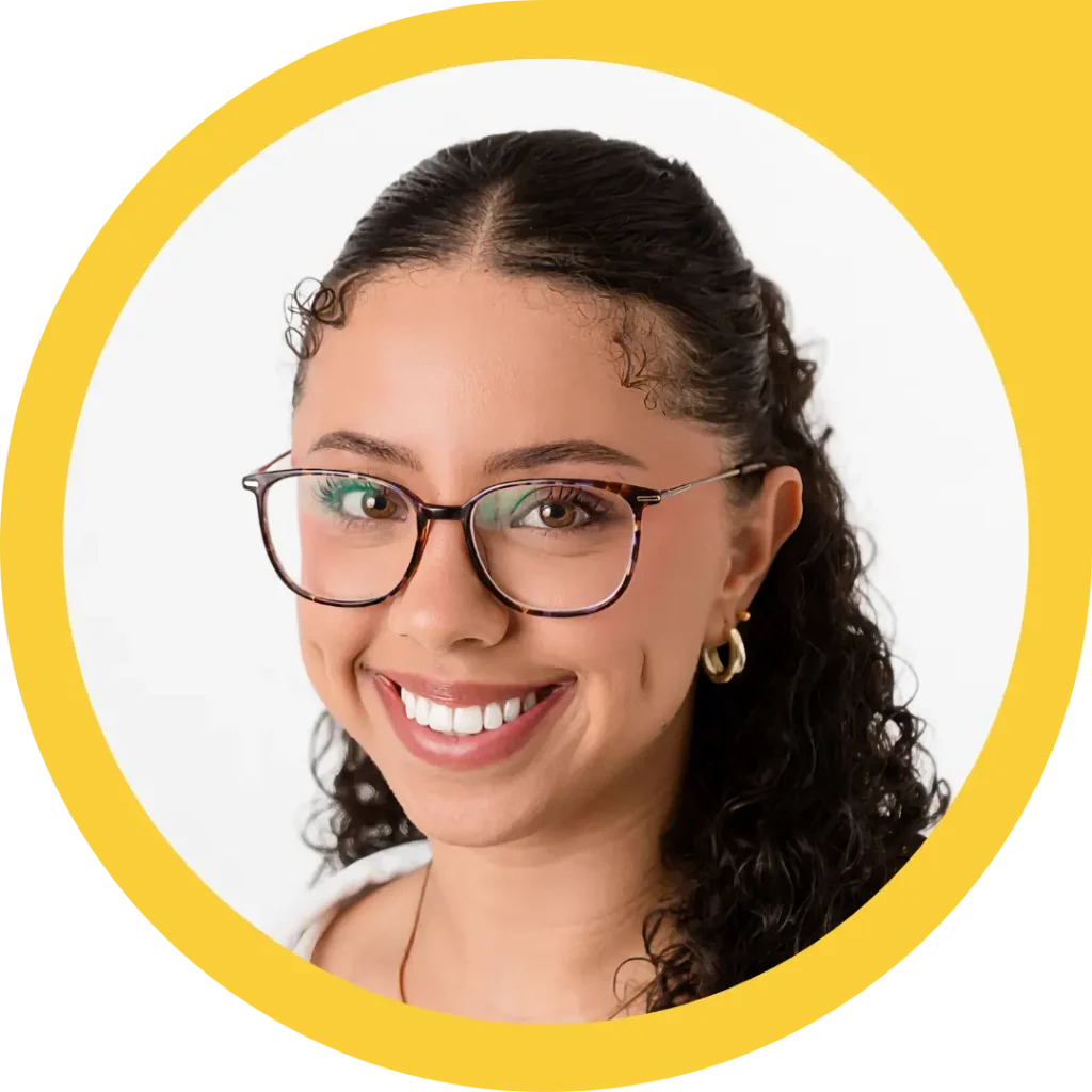 Co-Founder, Angelina, smiling at the camera