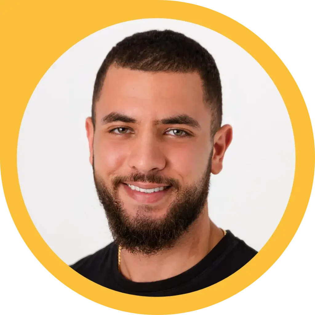 Co-Founder, Angelos, smiling at the camera